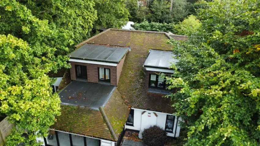 Moss build-up on roof tiles before cleaning, Gerrards Cross SL9