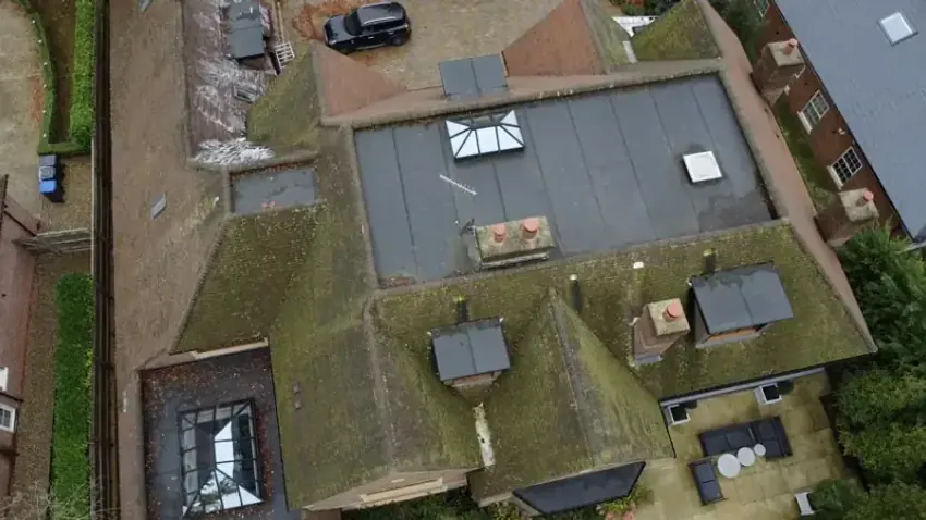 Aerial view of a moss-covered tiled roof, Henley-on-Thames RG9